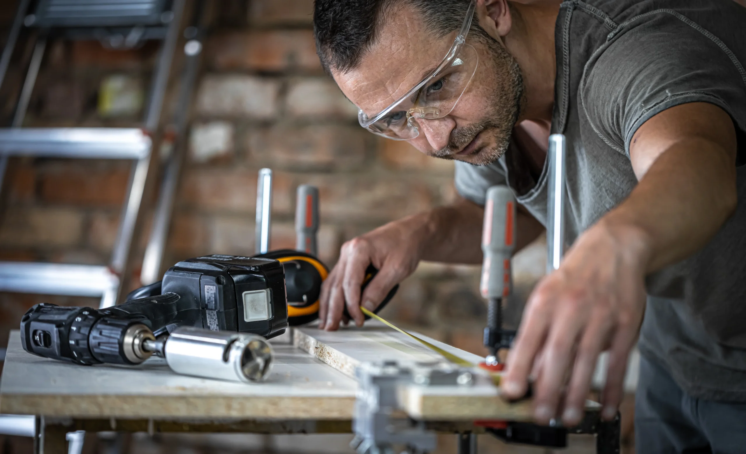 carpenter-process-professional-tool-precision-drilling-wood
